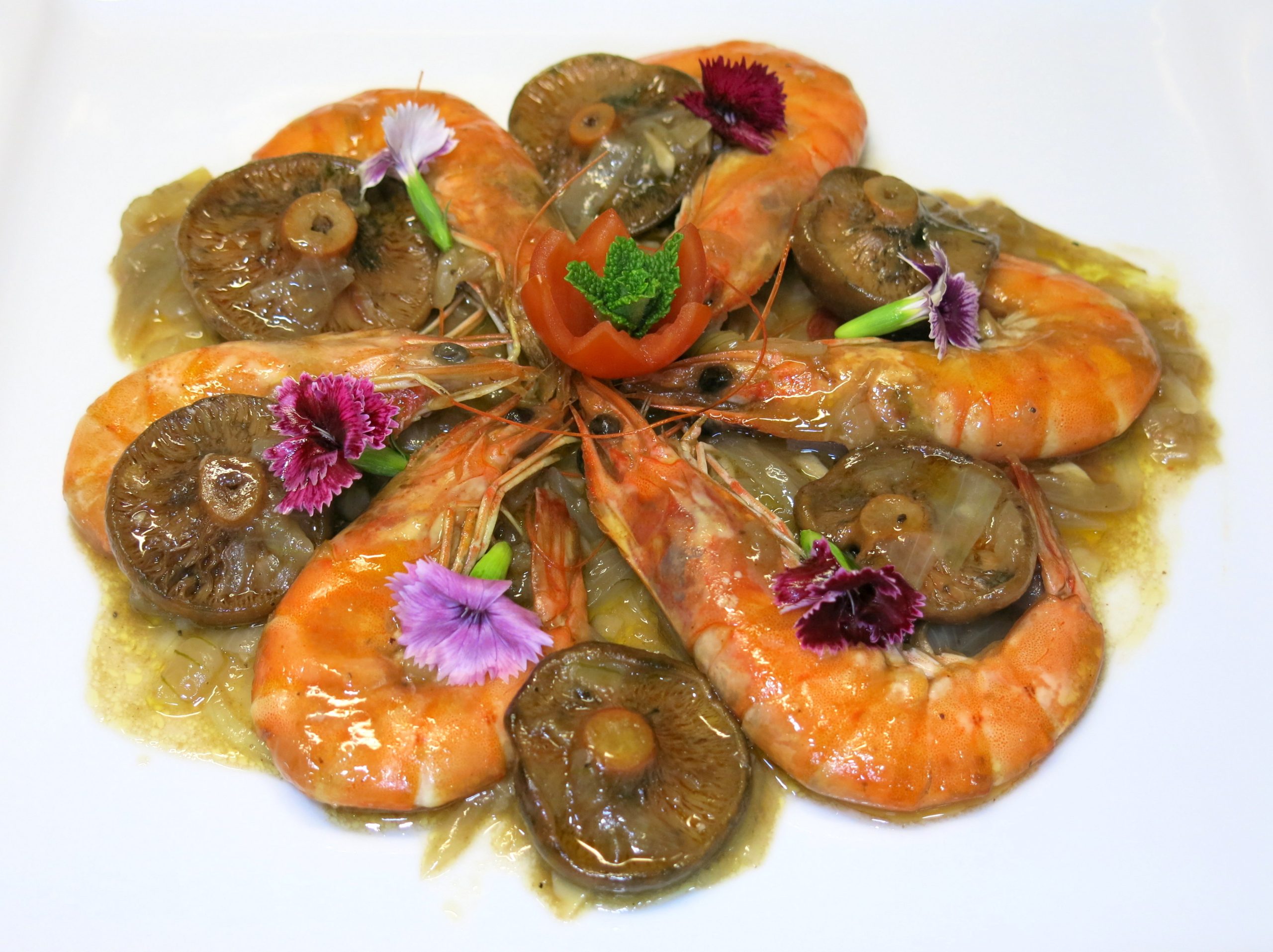 Langostinos y rebollones con salsa de whisky y chocolate